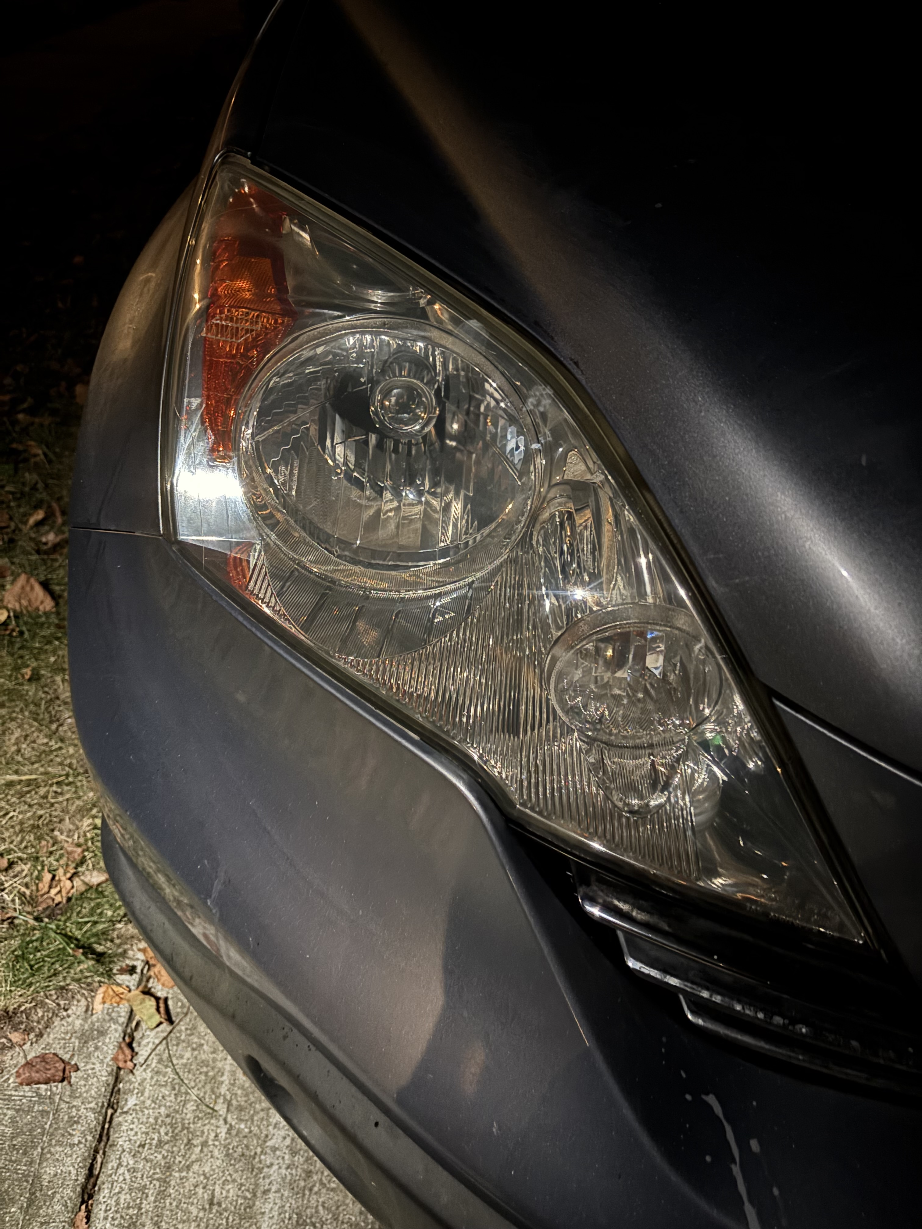 Before restoration — yellowed headlight